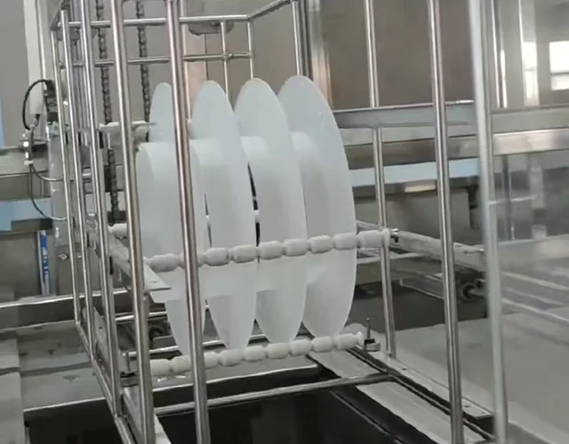 Racked quartz parts in an automatic ultrasonic cleaning line